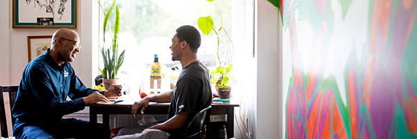 Two people in a consultation discussion